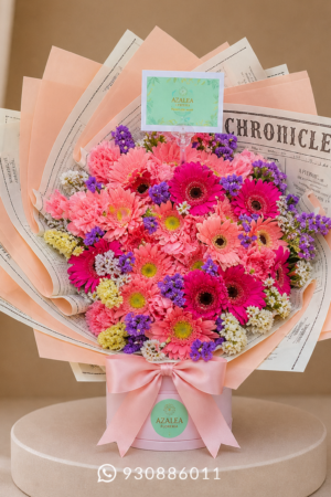 RAMO BUCHÓN DE ROSAS, GERBERAS Y ESTATIZ MORADA
